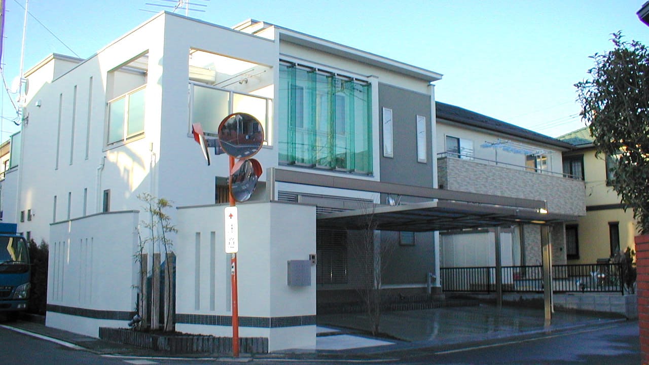 吹付仕上げの高級塀を施工した角地外構